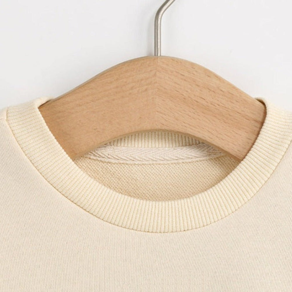 Unisex Beżowa Bluza Ikona – Miękka i Ponadczasowa Bluza